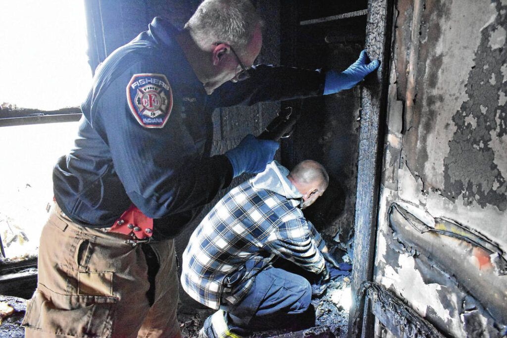 FIRE MARSHAL INSPECTING fire damage